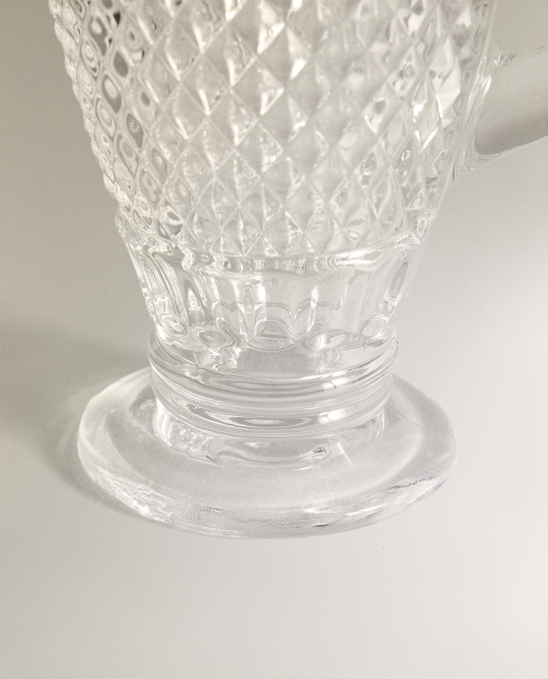 RAISED DESIGN GLASS JUG