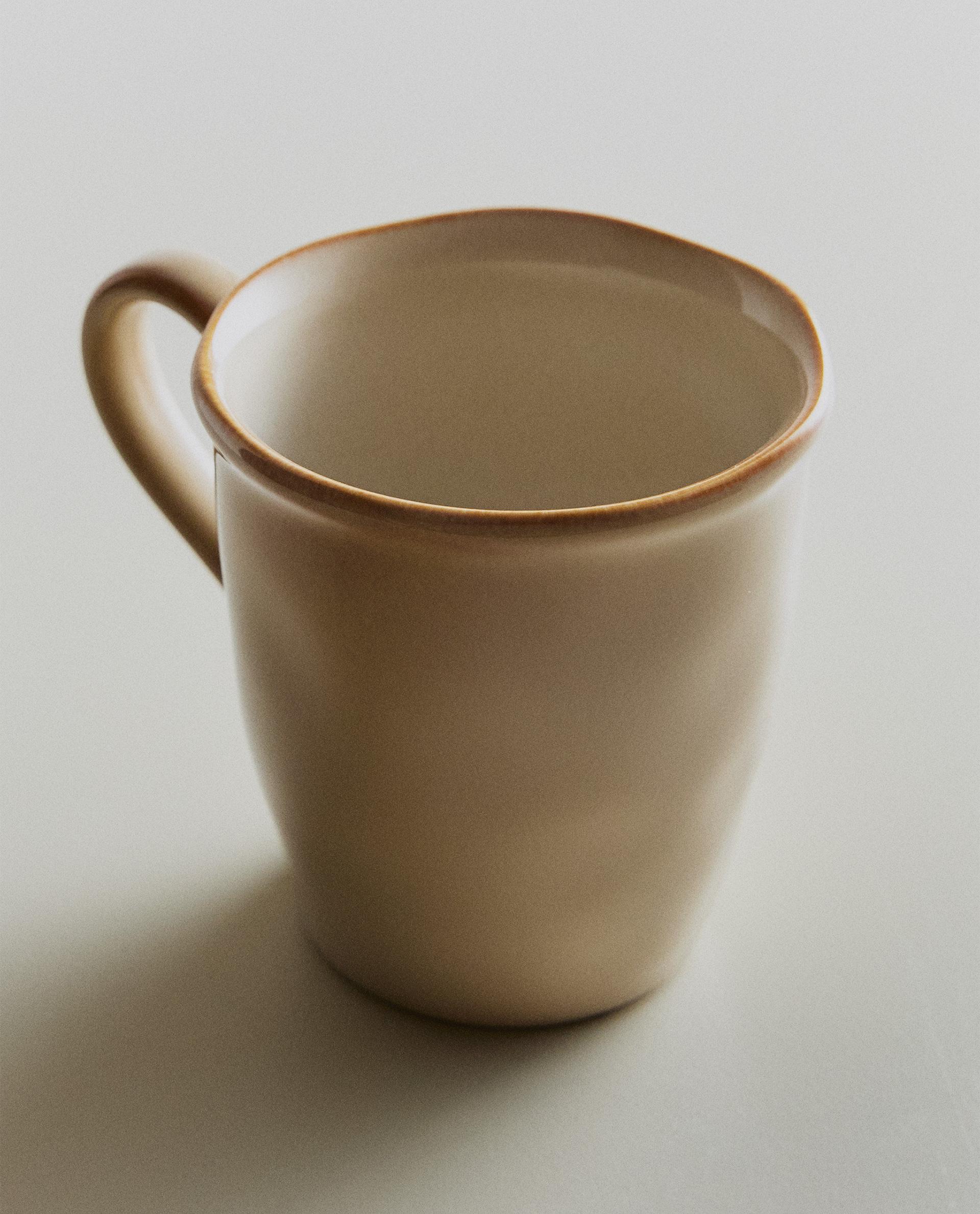 STONEWARE MUG WITH IRREGULAR EDGE STONEWARE MUG WITH IRREGULAR EDGE