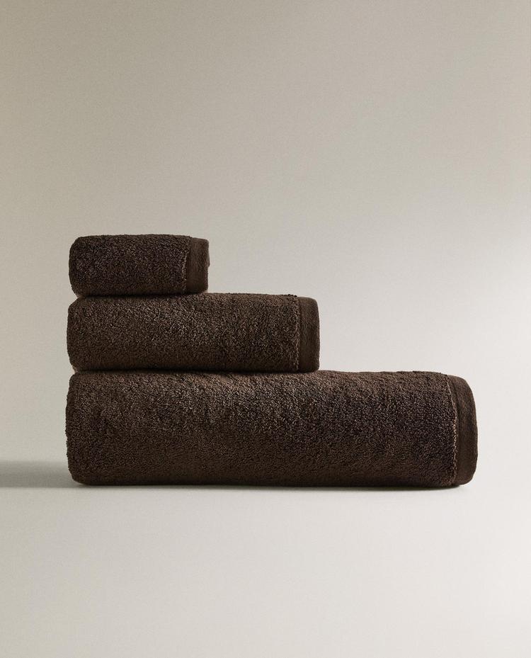 FARBIGES FROTTEE-BADEHANDTUCH