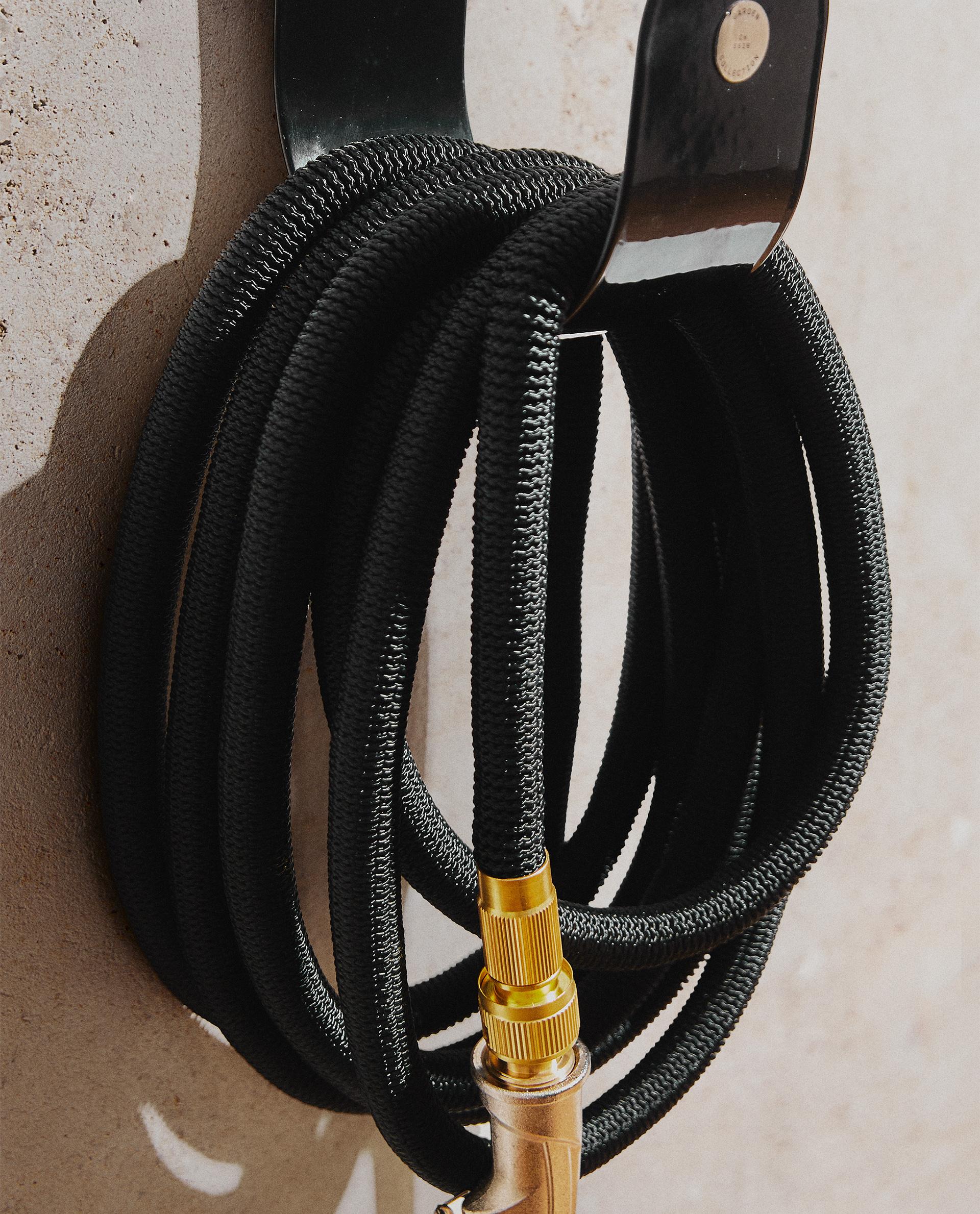 GARDEN HOSE AND HOLDER GARDEN HOSE AND HOLDER