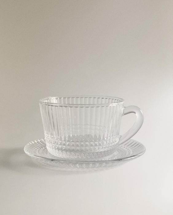 GLASS TEACUP WITH RAISED GEOMETRIC DESIGN