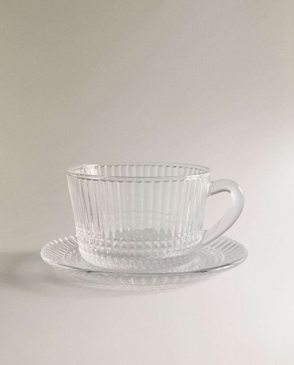 GLASS TEACUP WITH RAISED GEOMETRIC DESIGN