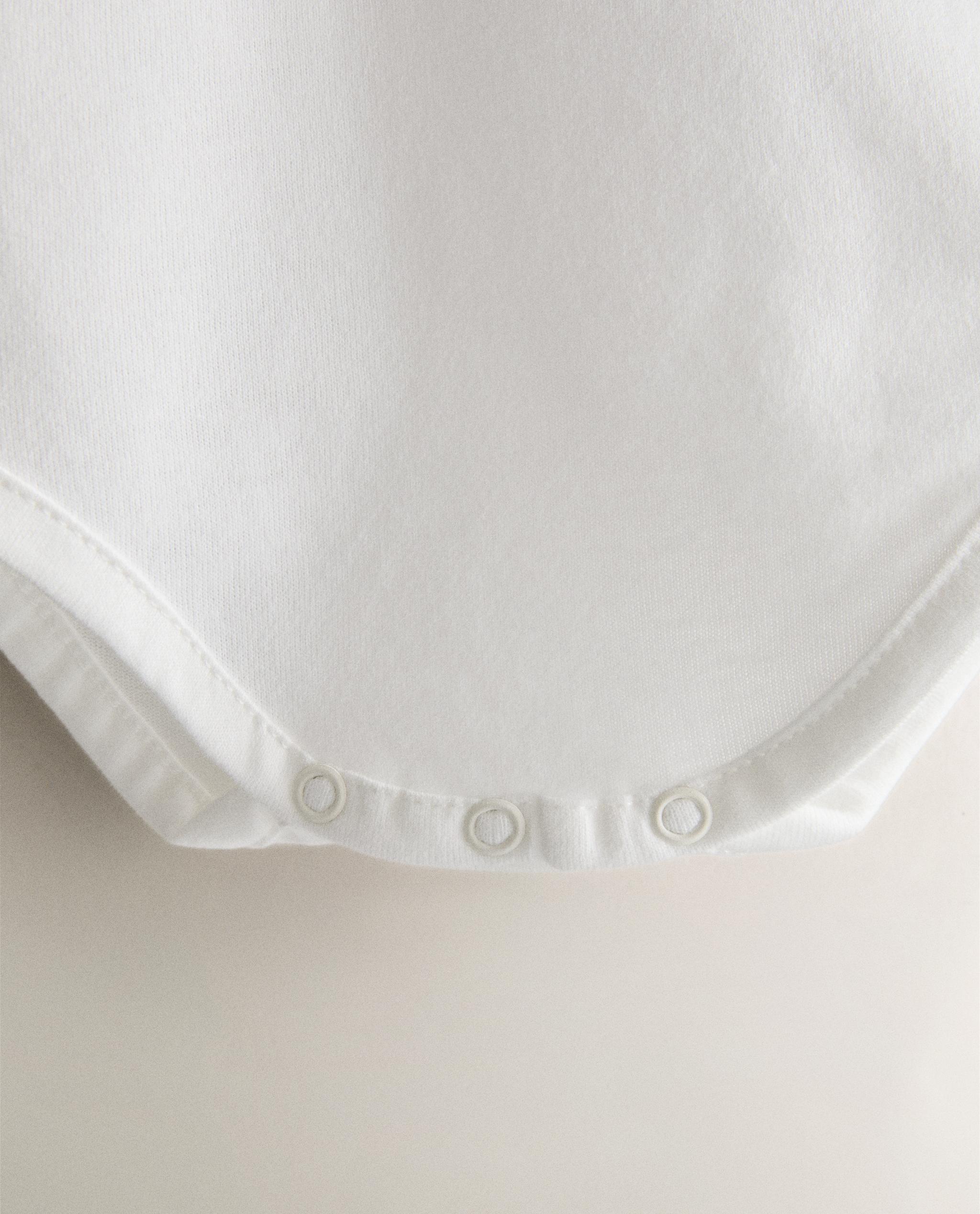 CHILDREN'S BODYSUIT WITH RABBITS AND FLOWERS product thumbnail 2