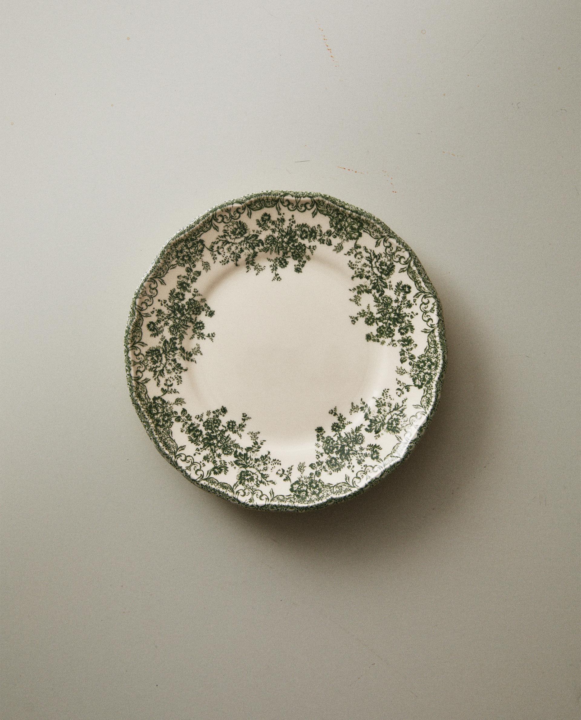 GREEN FLORAL EARTHENWARE SIDE PLATE