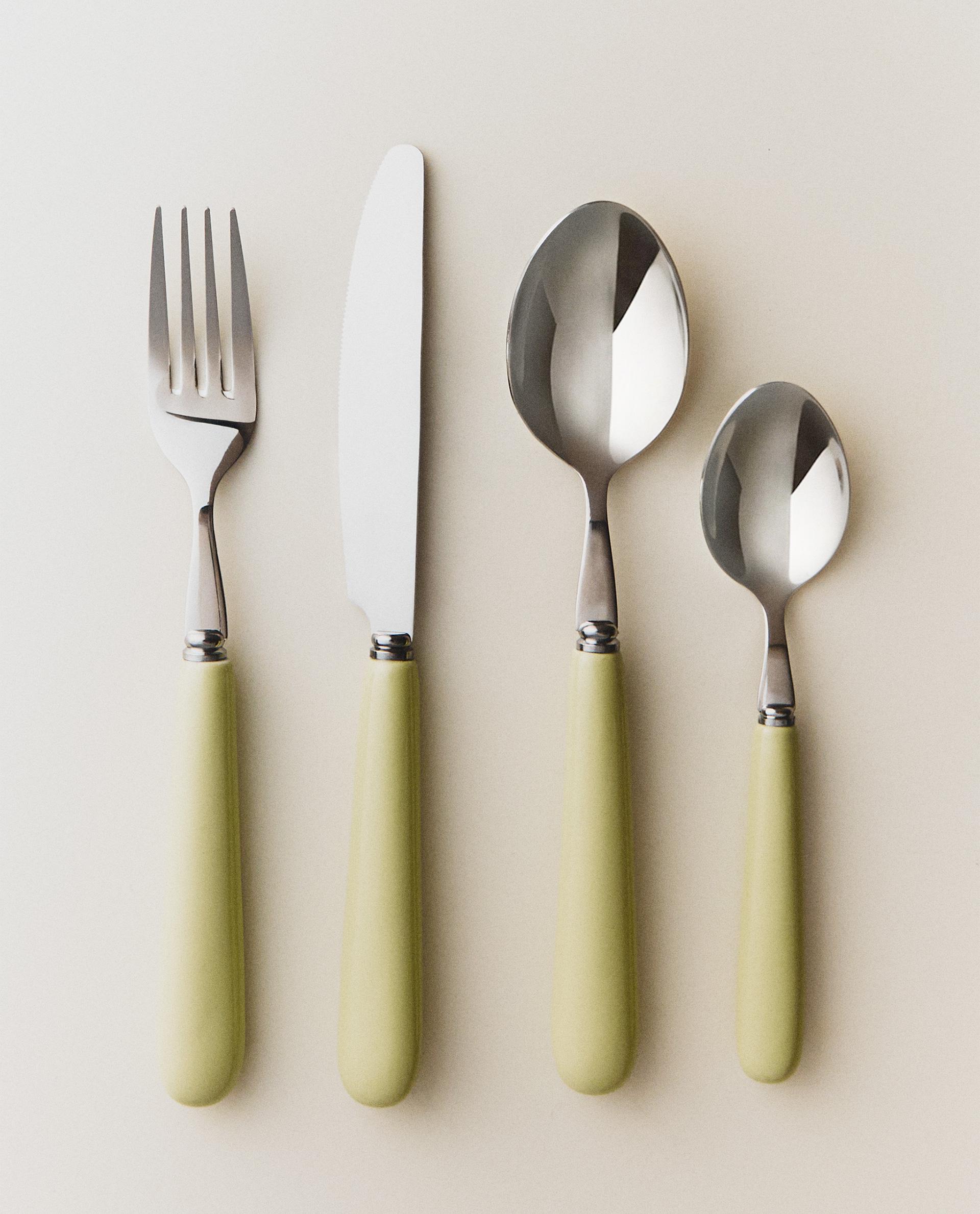 4-PIECE CUTLERY SET WITH CERAMIC HANDLE 4-PIECE CUTLERY SET WITH CERAMIC HANDLE