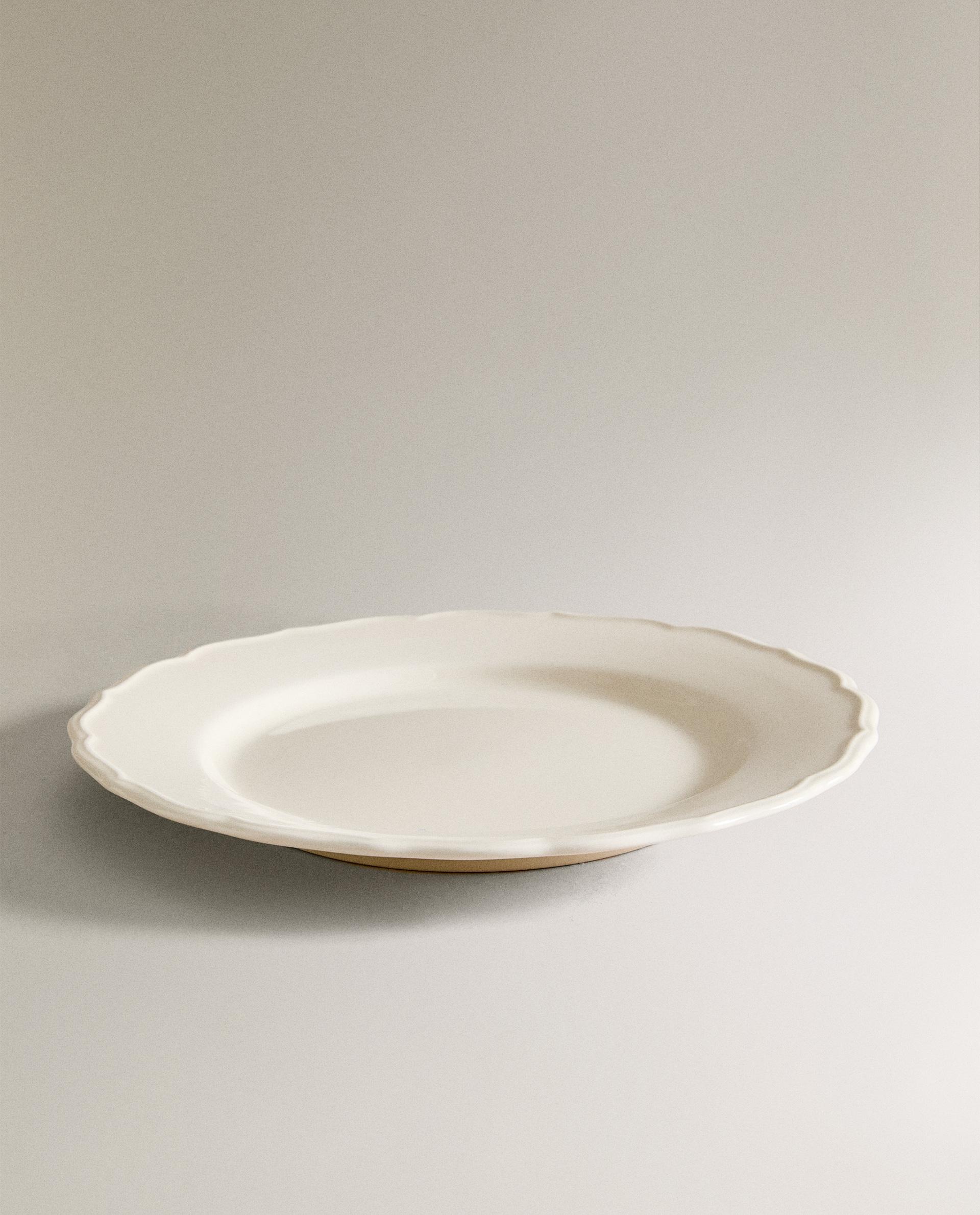 EARTHENWARE DINNER DISH WITH RAISED-DESIGN EDGE