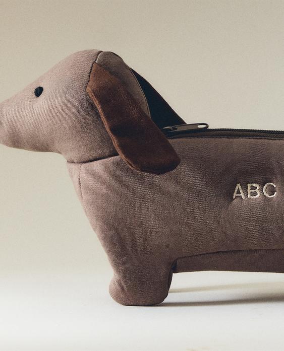 مقلمة للأطفال على شكل كلب