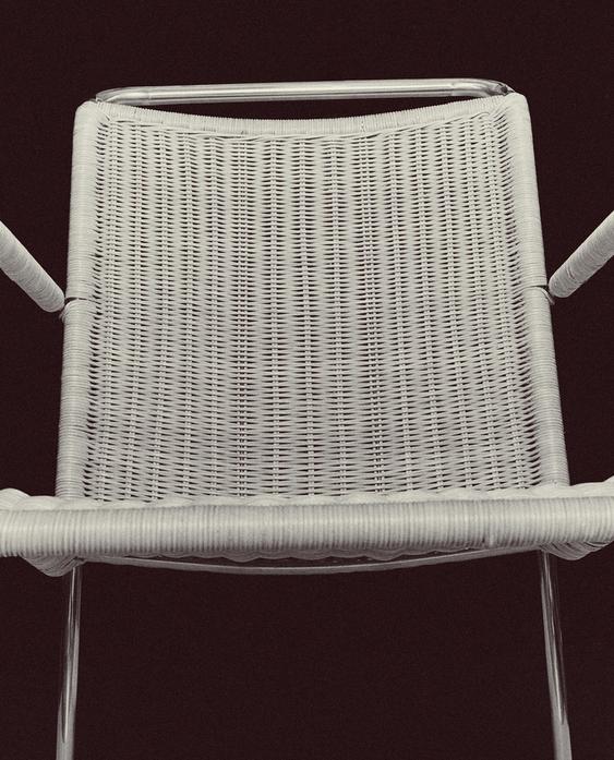 RATTAN AND STEEL ACCENT CHAIR