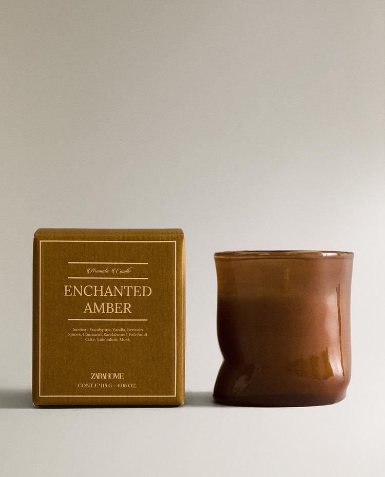 (115 G) ENCHANTED AMBER SCENTED CANDLE