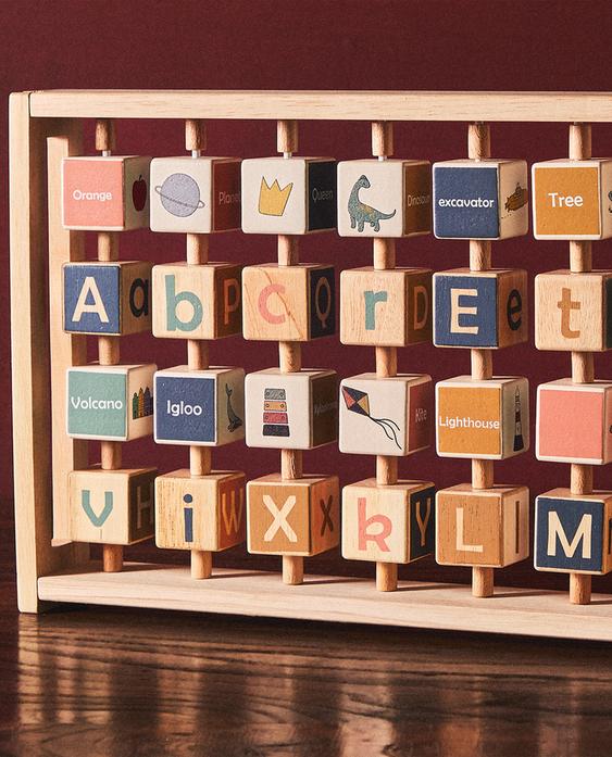 CHILDREN’S WOODEN ALPHABET TOY