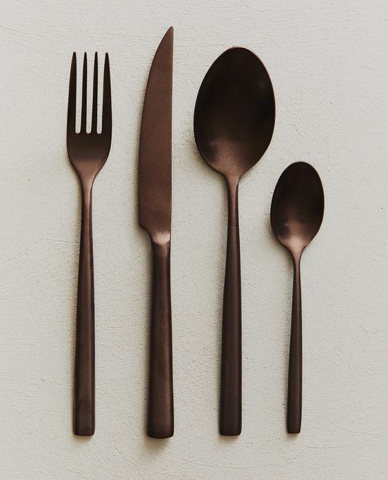 4-PIECE VINTAGE STEEL CUTLERY SET