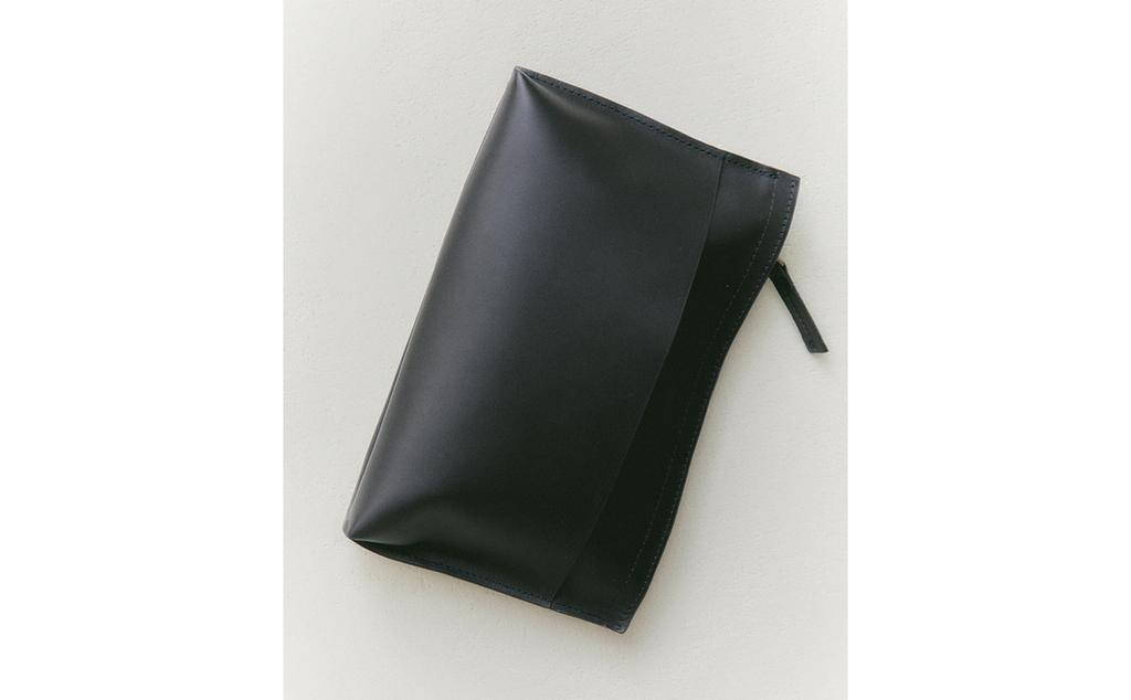 حقيبة غسيل جلد بنمط الكلاتش