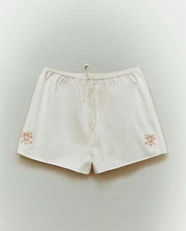 PANTALONI SCURȚI CU BRODERIE FLORALĂ