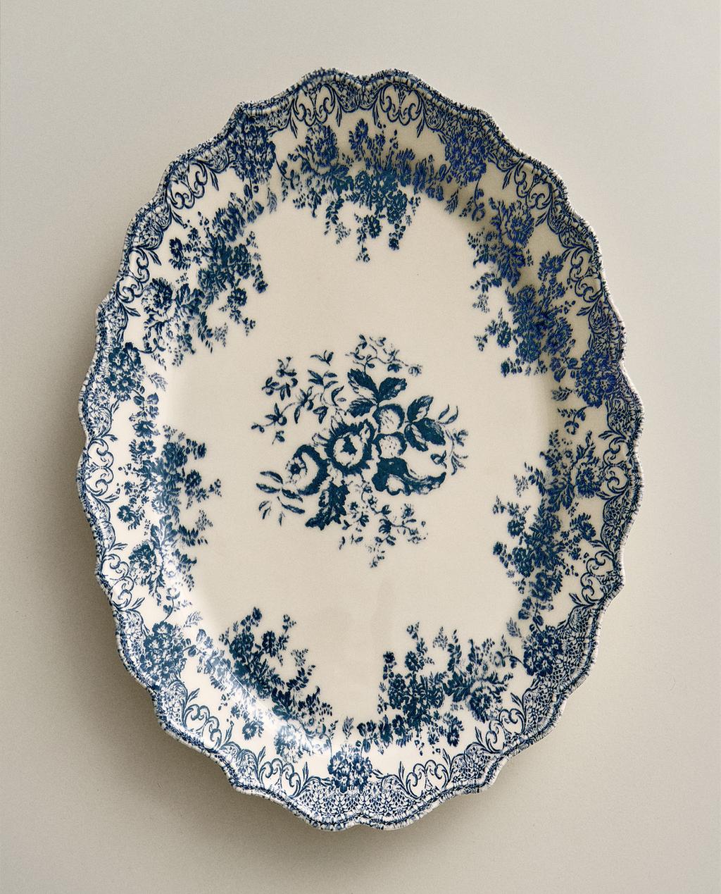 SERVIERTELLER AUS STEINGUT MIT BLUMENMOTIVEN SERVIERTELLER AUS STEINGUT MIT BLUMENMOTIVEN