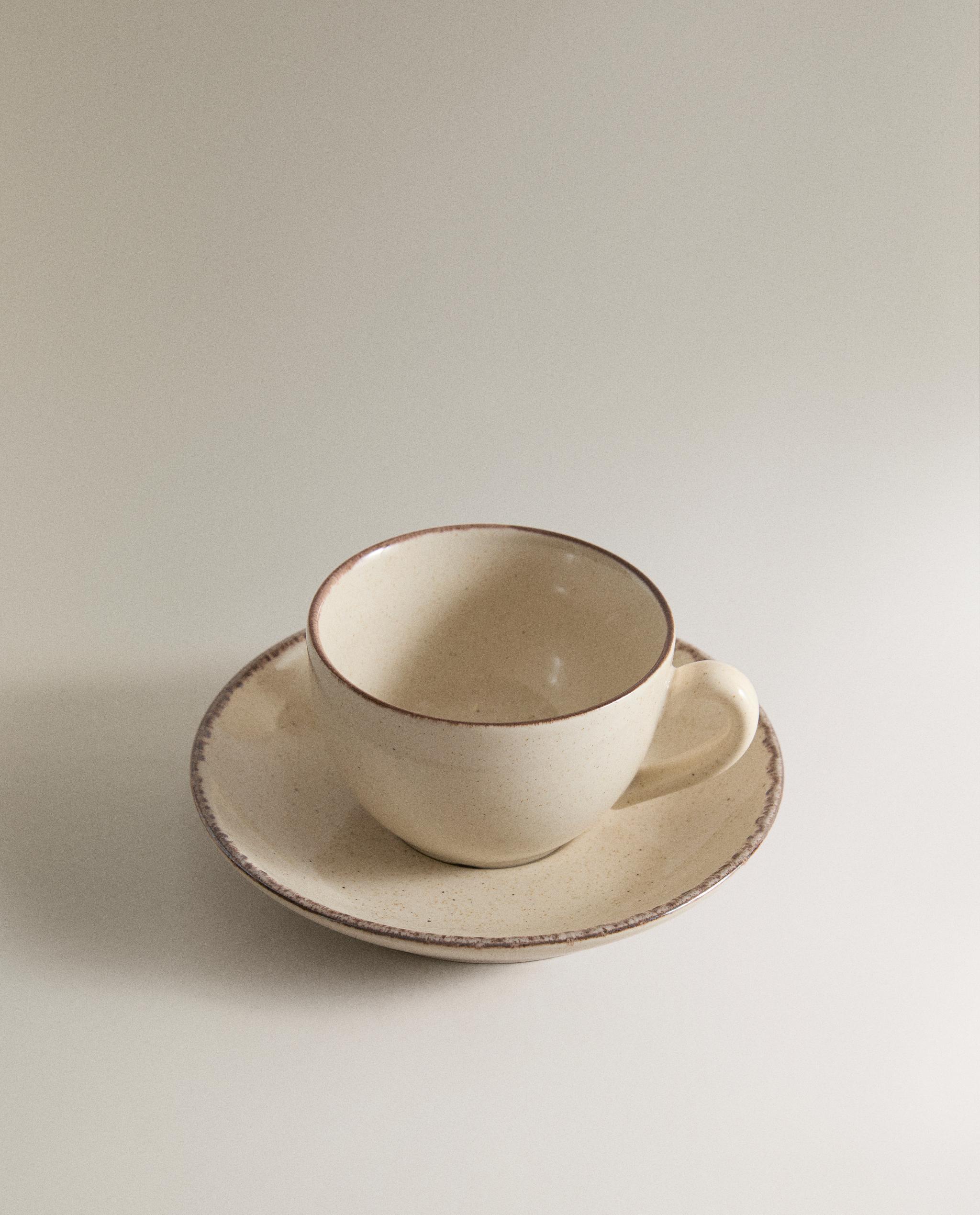 STONEWARE TEACUP AND SAUCER WITH ANTIQUE FINISH RIM product thumbnail 5