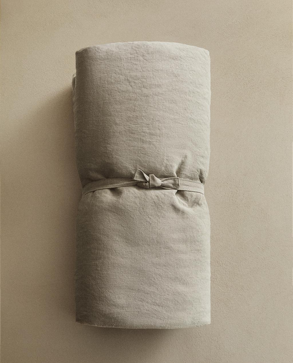 POLSTER IM USED-LOOK AUS LEINEN