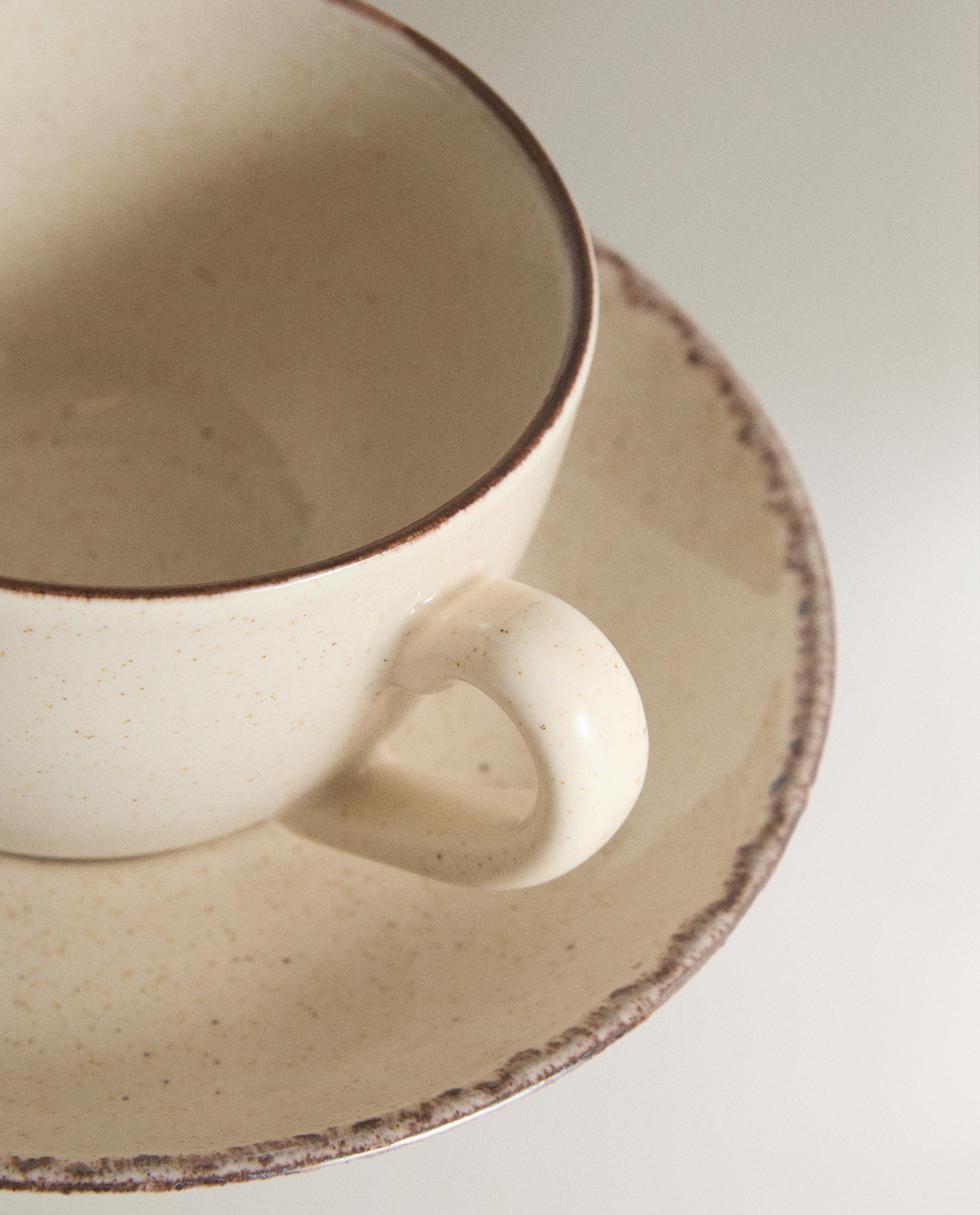 STONEWARE TEACUP AND SAUCER WITH ANTIQUE FINISH RIM product thumbnail 8