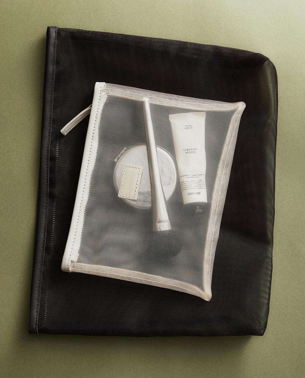 TOILETRY BAGS, HAND CREAM, AND BRUSH