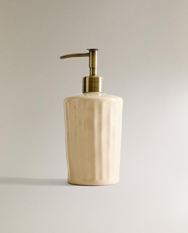 RAISED DESIGN SOAP DISPENSER