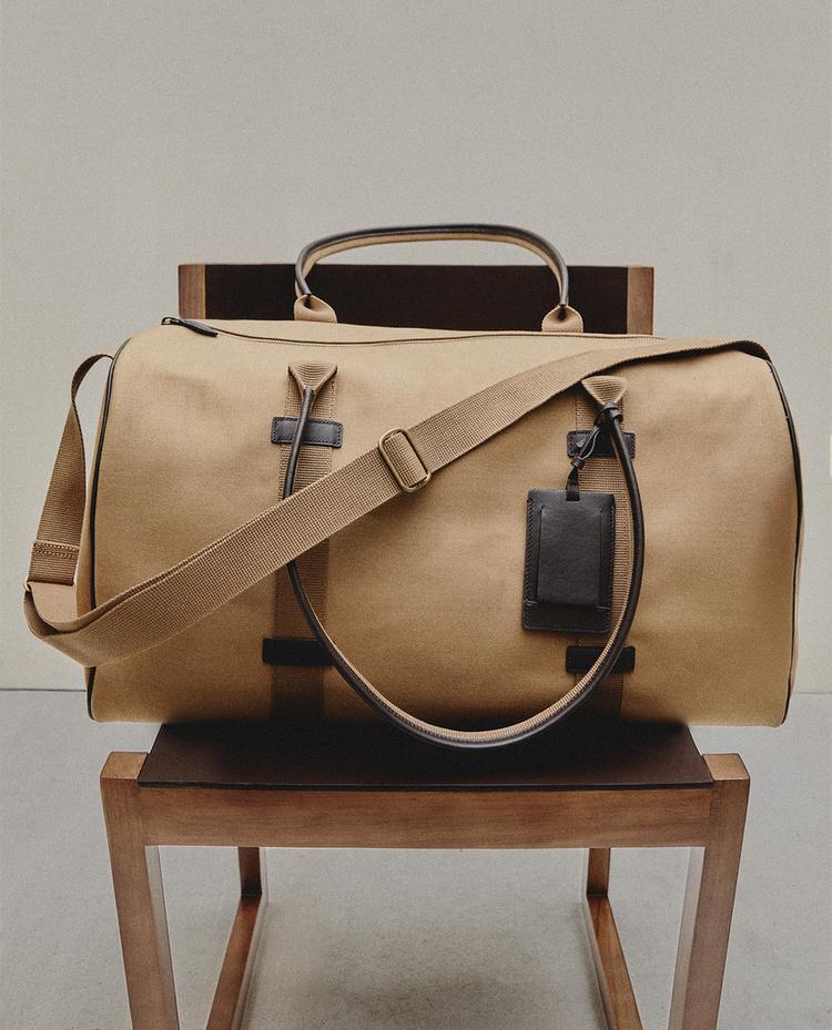 KATOENEN EN LEREN REISTAS