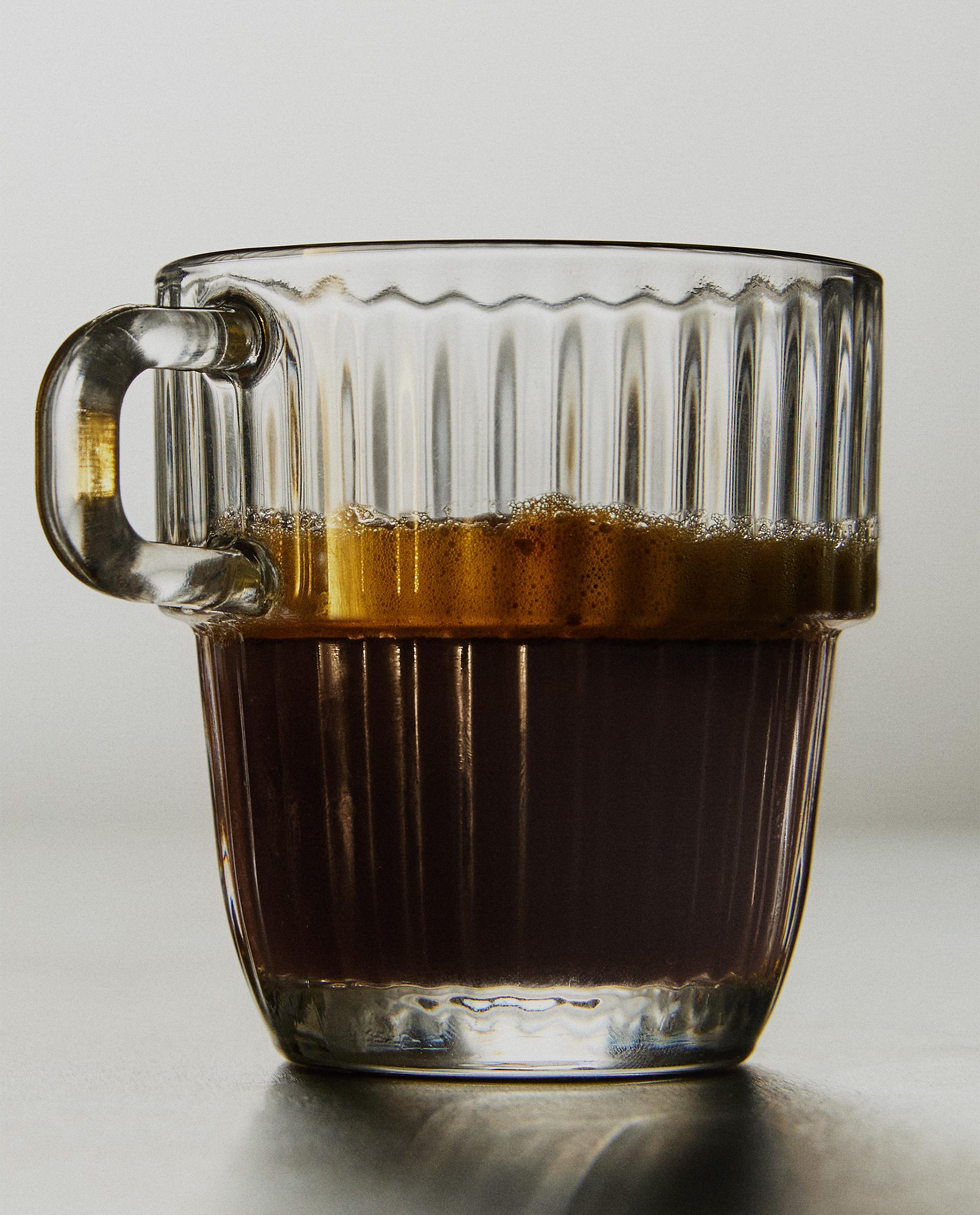 GLASS CUP WITH RAISED DESIGN GLASS CUP WITH RAISED DESIGN