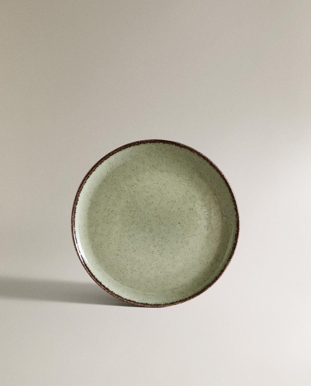 BROTTELLER AUS PORZELLAN MIT RAND IM ANTIK-LOOK