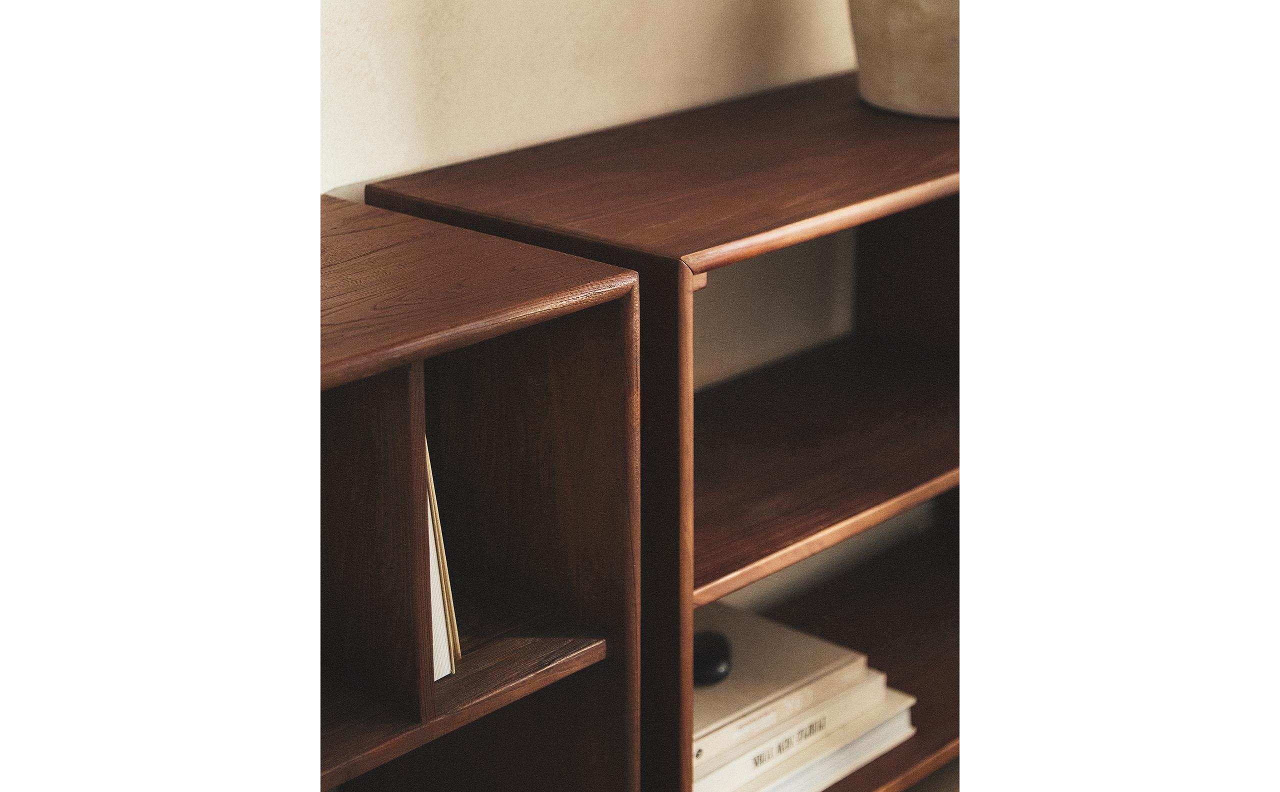 LOW BOOKCASE WITH IRREGULAR SHELVES