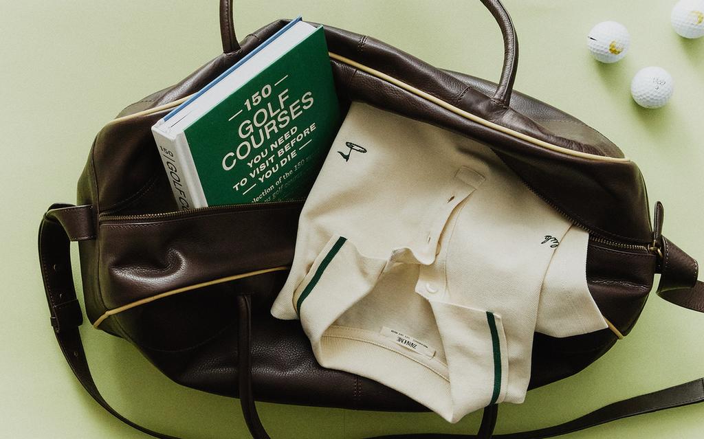 POLO, BOLSO DE PIEL, LIBRO Y BOLAS GOLF