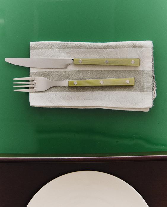 CUTLERY AND STRIPED NAPKIN