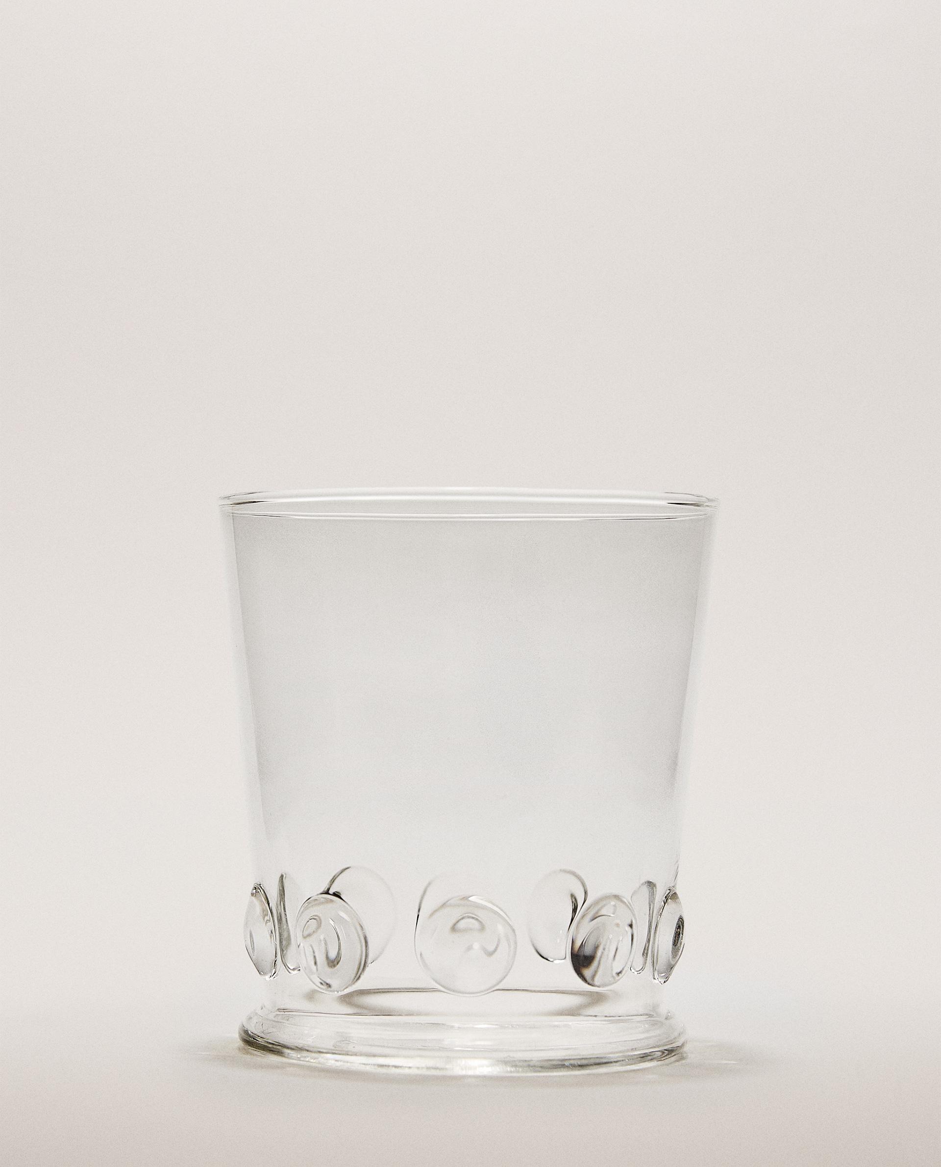 BOROSILICATE TUMBLER WITH RAISED FLOWERS BOROSILICATE TUMBLER WITH RAISED FLOWERS