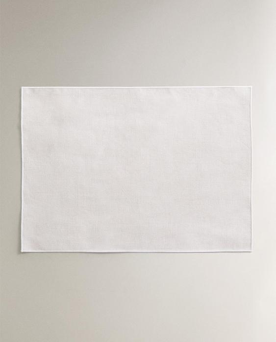 مفرش مغلف بالراتنج بدرزة الأوفرلوك