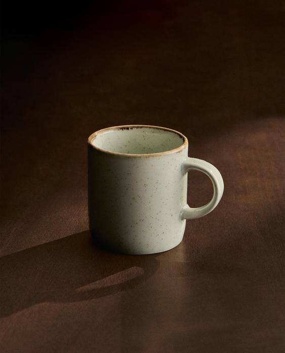 PORCELAIN MUG WITH ANTIQUE FINISH RIM
