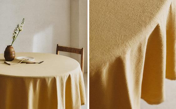 RUNDE TISCHDECKE AUS GARNGEFÄRBTEM GEWEBE