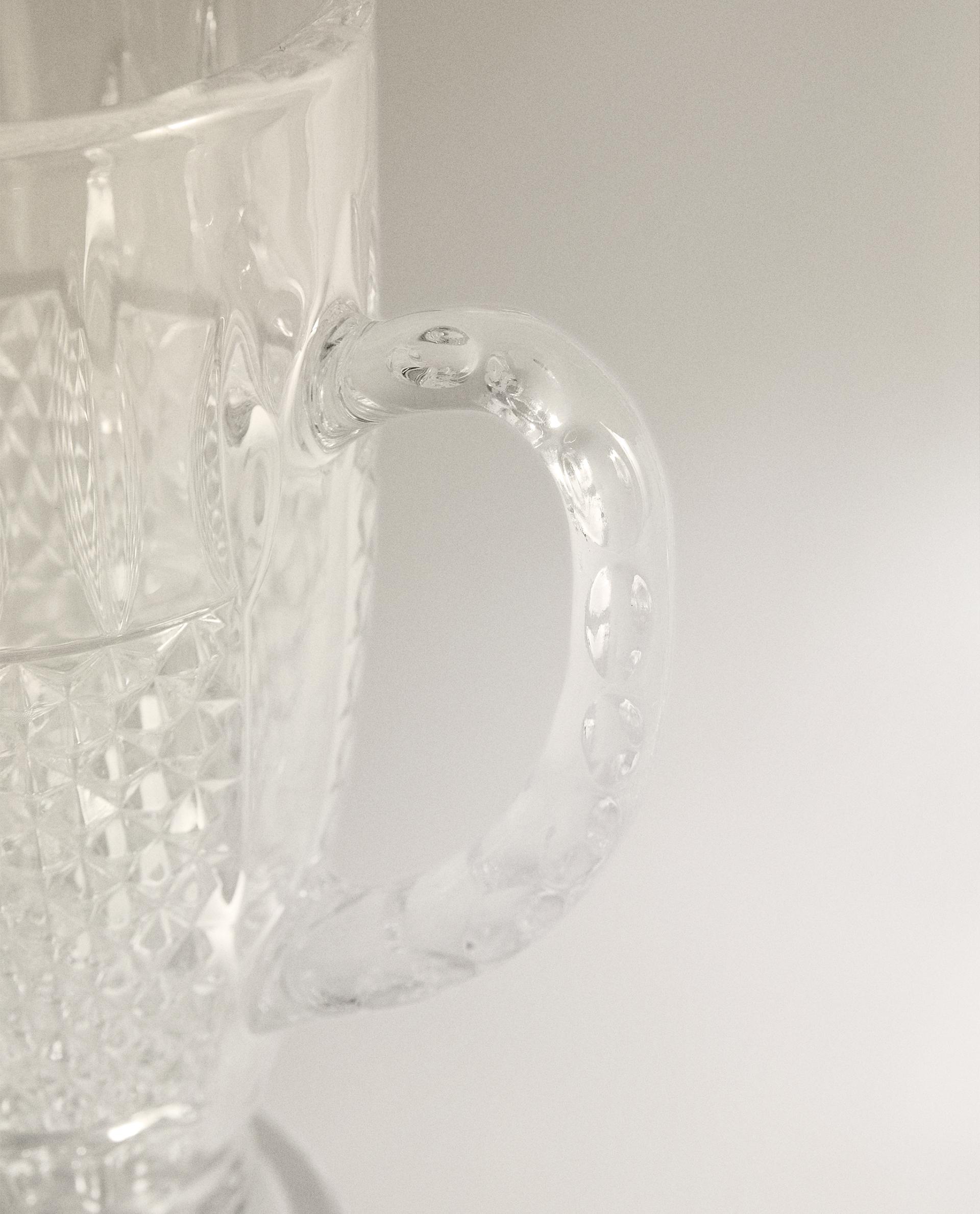 RAISED DESIGN GLASS JUG