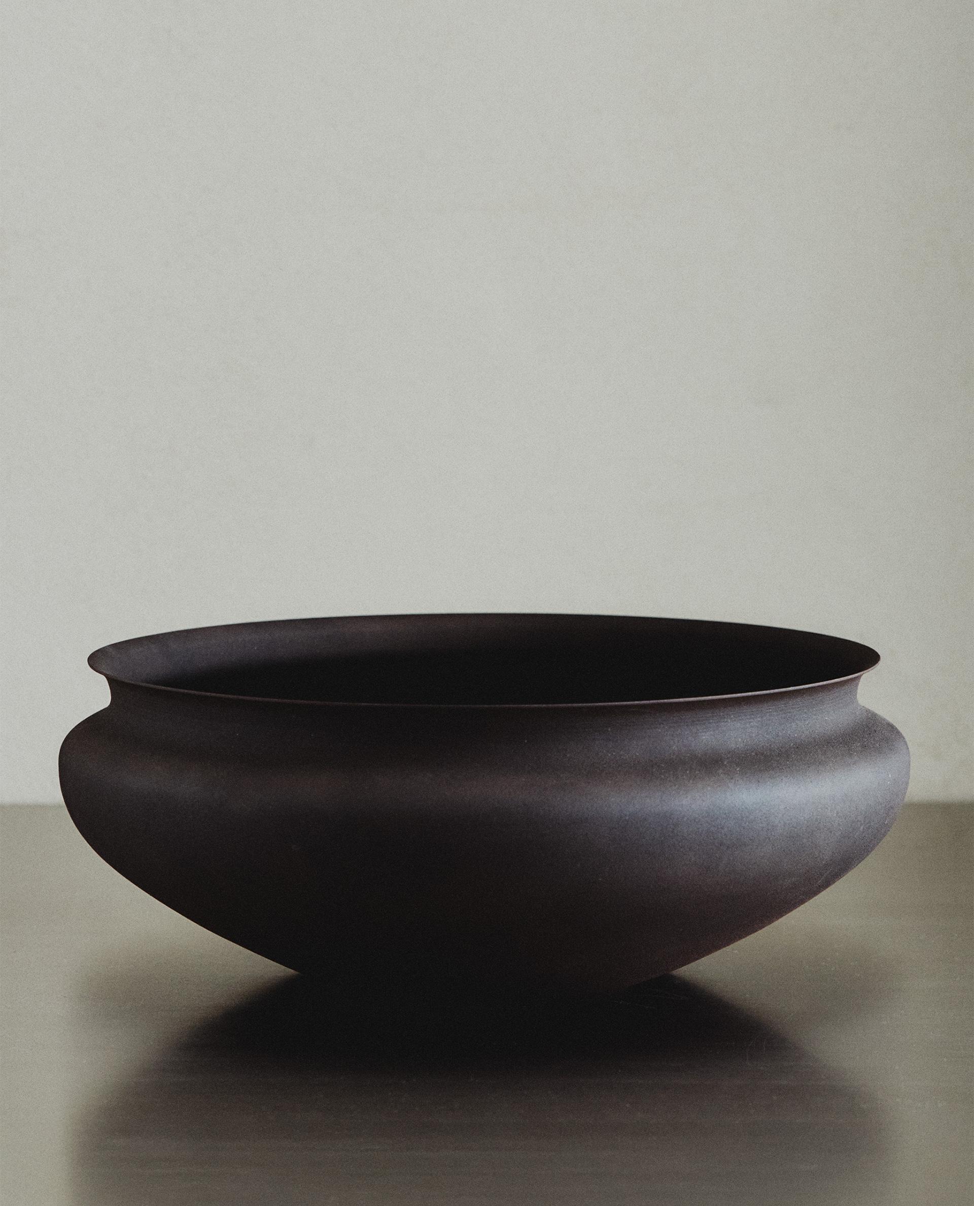 LOW METAL VESSEL