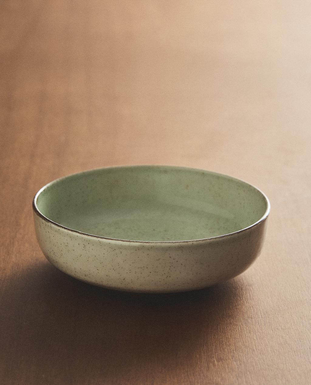 PORCELAIN BOWL WITH ANTIQUE FINISH RIM