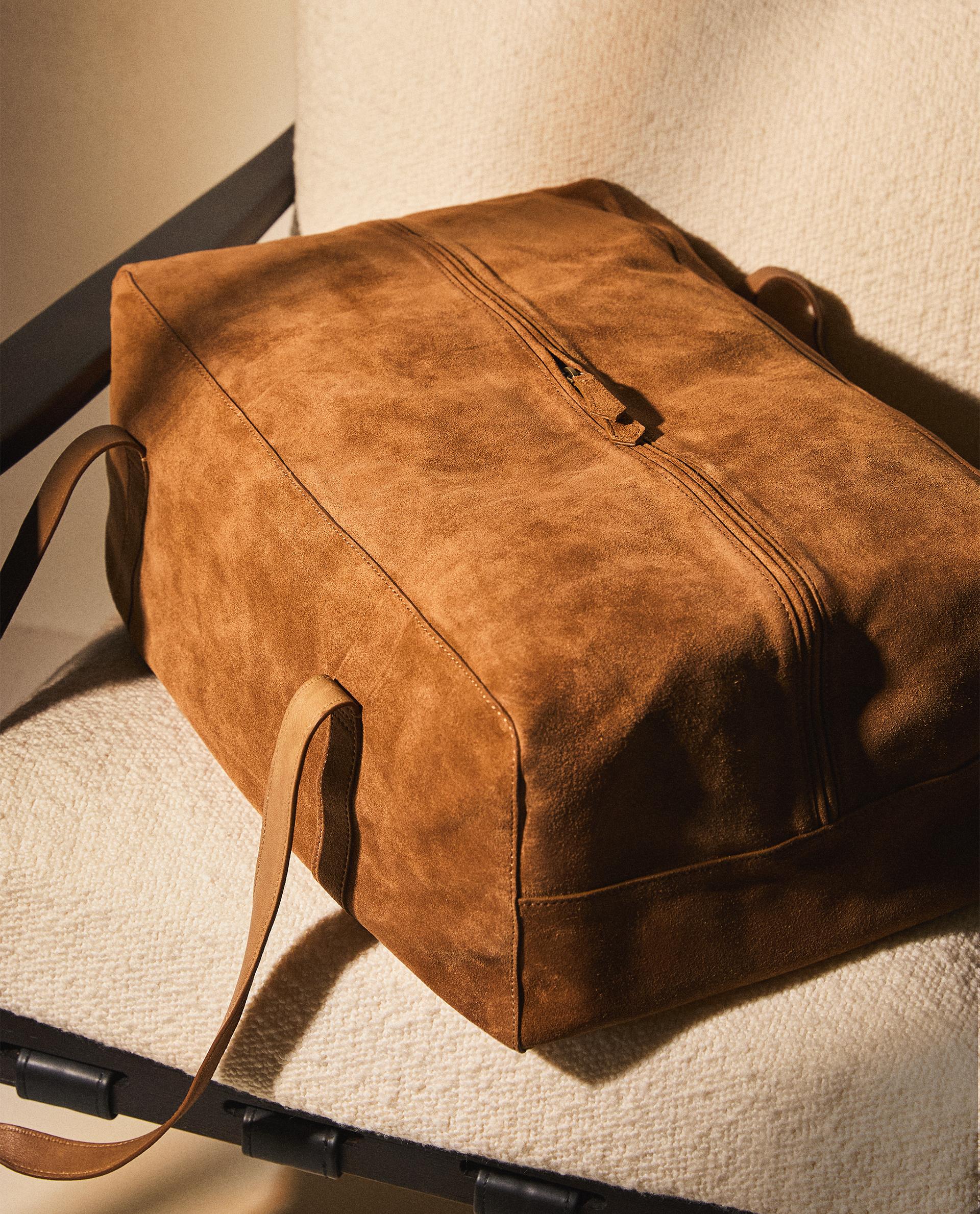 SPLIT LEATHER AND LEATHER SUITCASE