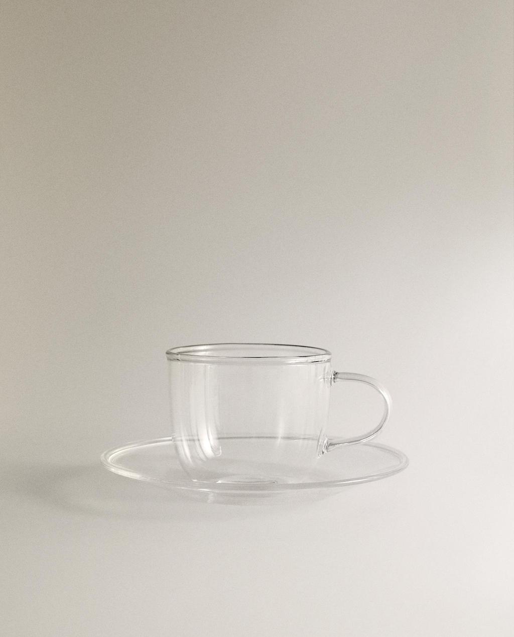 TEETASSE UND UNTERTASSE AUS BOROSILIKATGLAS MIT SILBERRAND TEETASSE UND UNTERTASSE AUS BOROSILIKATGLAS MIT SILBERRAND