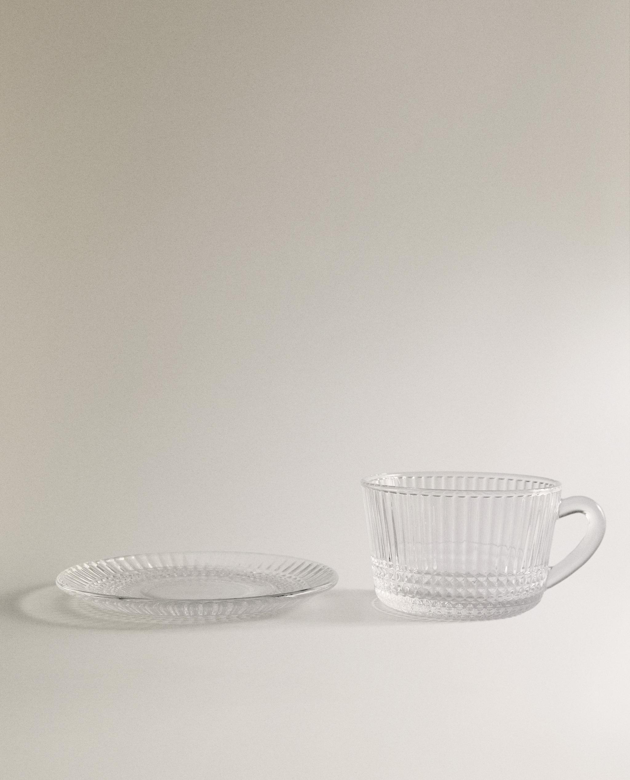 GLASS TEACUP AND SAUCER WITH RAISED GEOMETRIC DESIGN product thumbnail 4