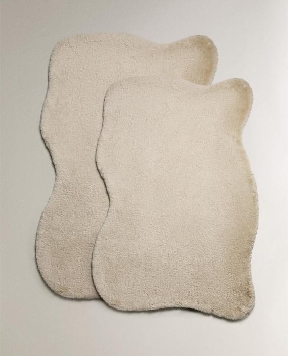 IRREGULAR FAUX FUR RUG