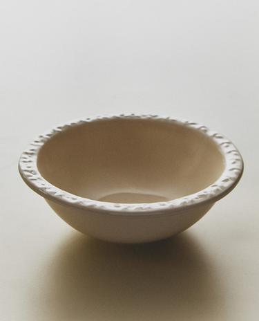 EARTHENWARE BOWL WITH RAISED-DESIGN EDGE