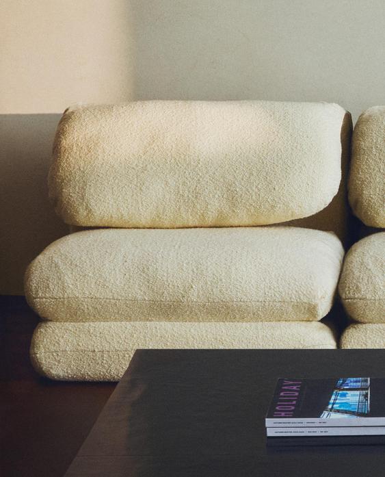FOLDING BOUCLÉ ARMCHAIR