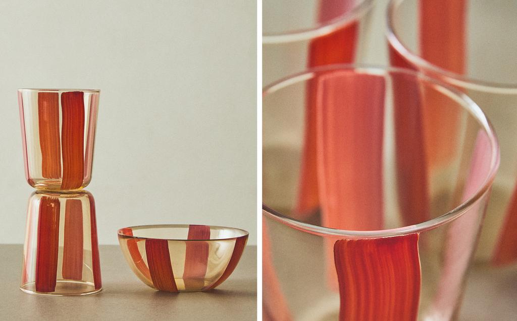 أواني زجاج بخطوط ملونة