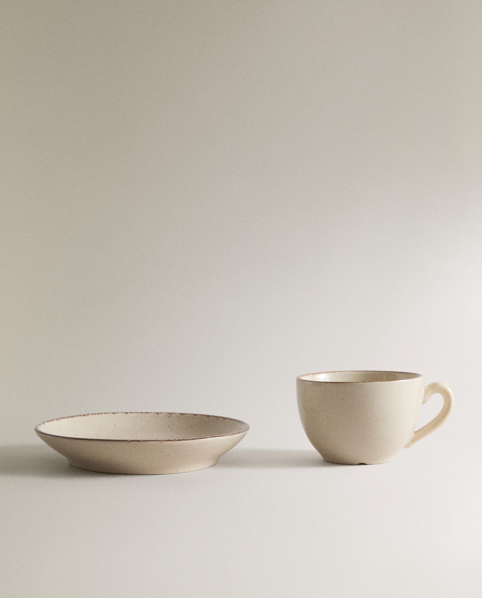 STONEWARE TEACUP AND SAUCER WITH ANTIQUE FINISH RIM product thumbnail 4