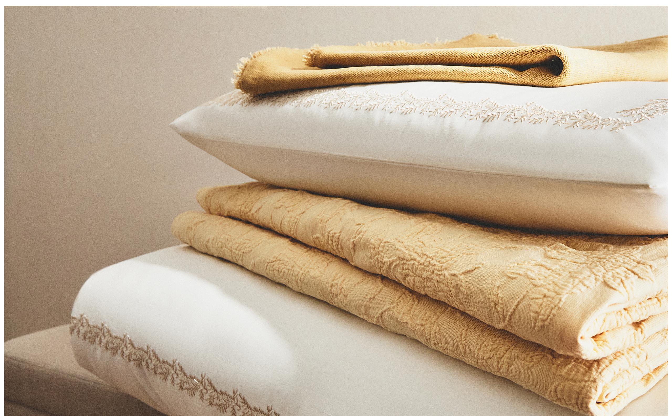 THROWS AND CUSHION COVERS