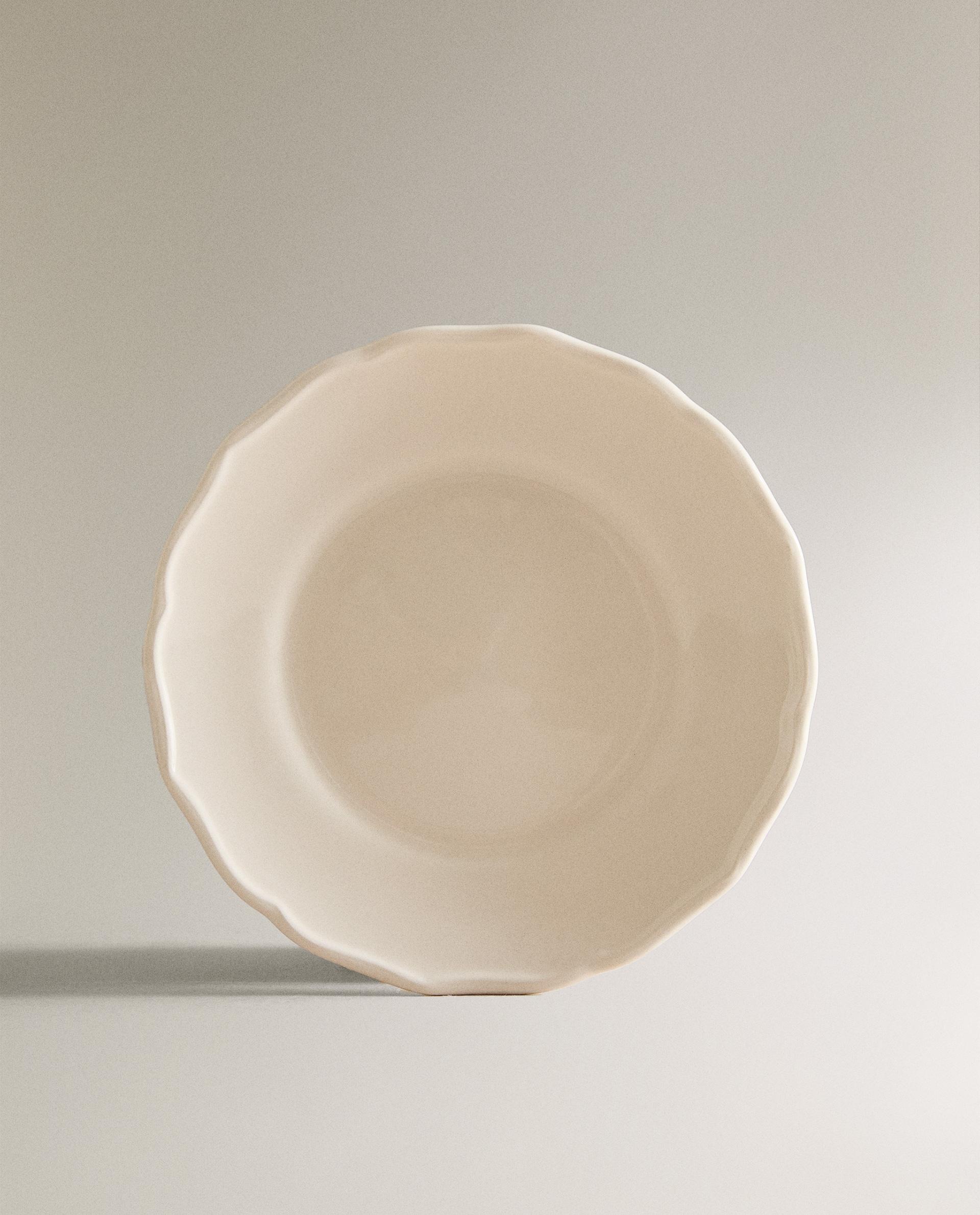 EARTHENWARE SIDE PLATE WITH RAISED-DESIGN EDGE