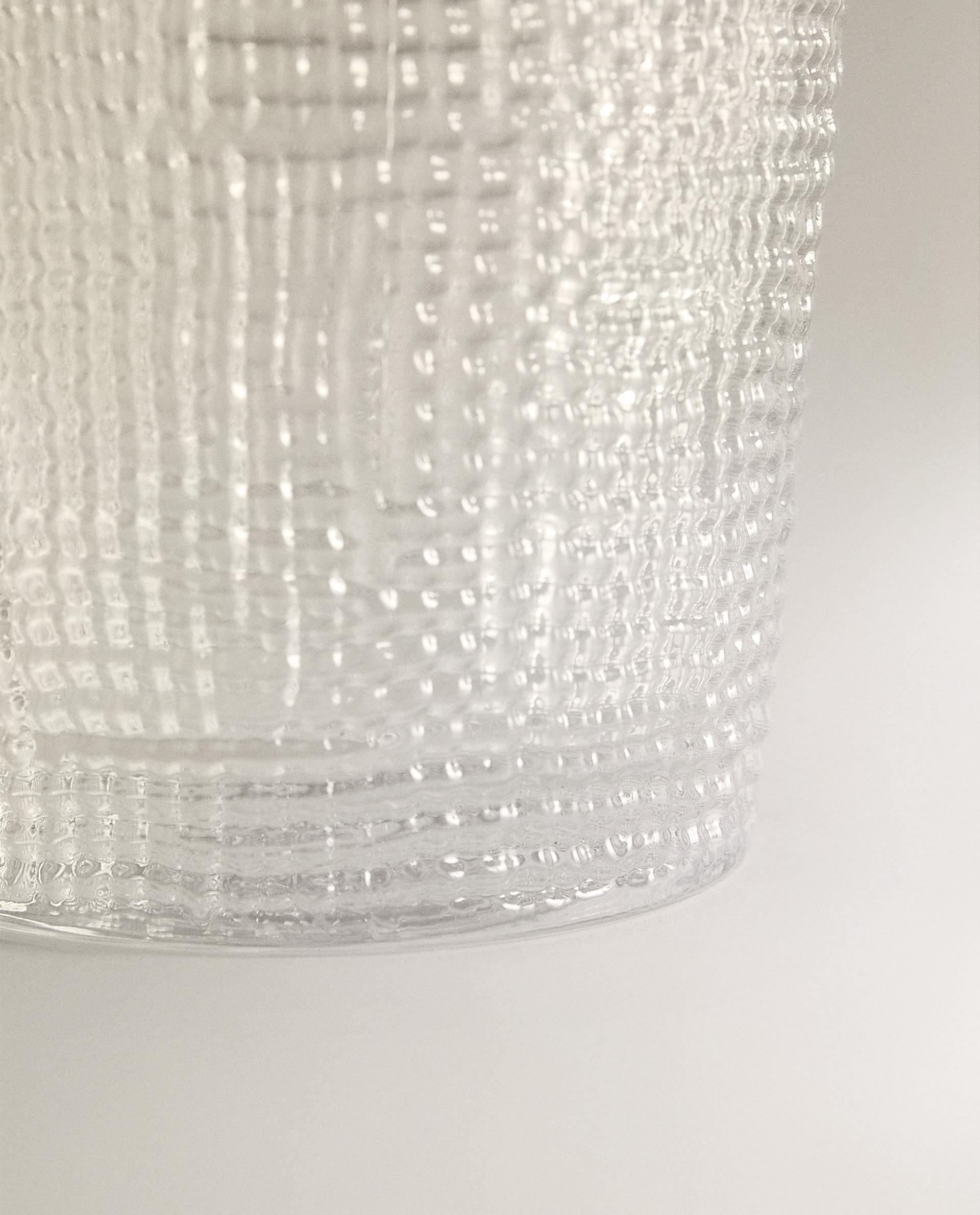 GLASS CUP WITH RAISED DESIGN