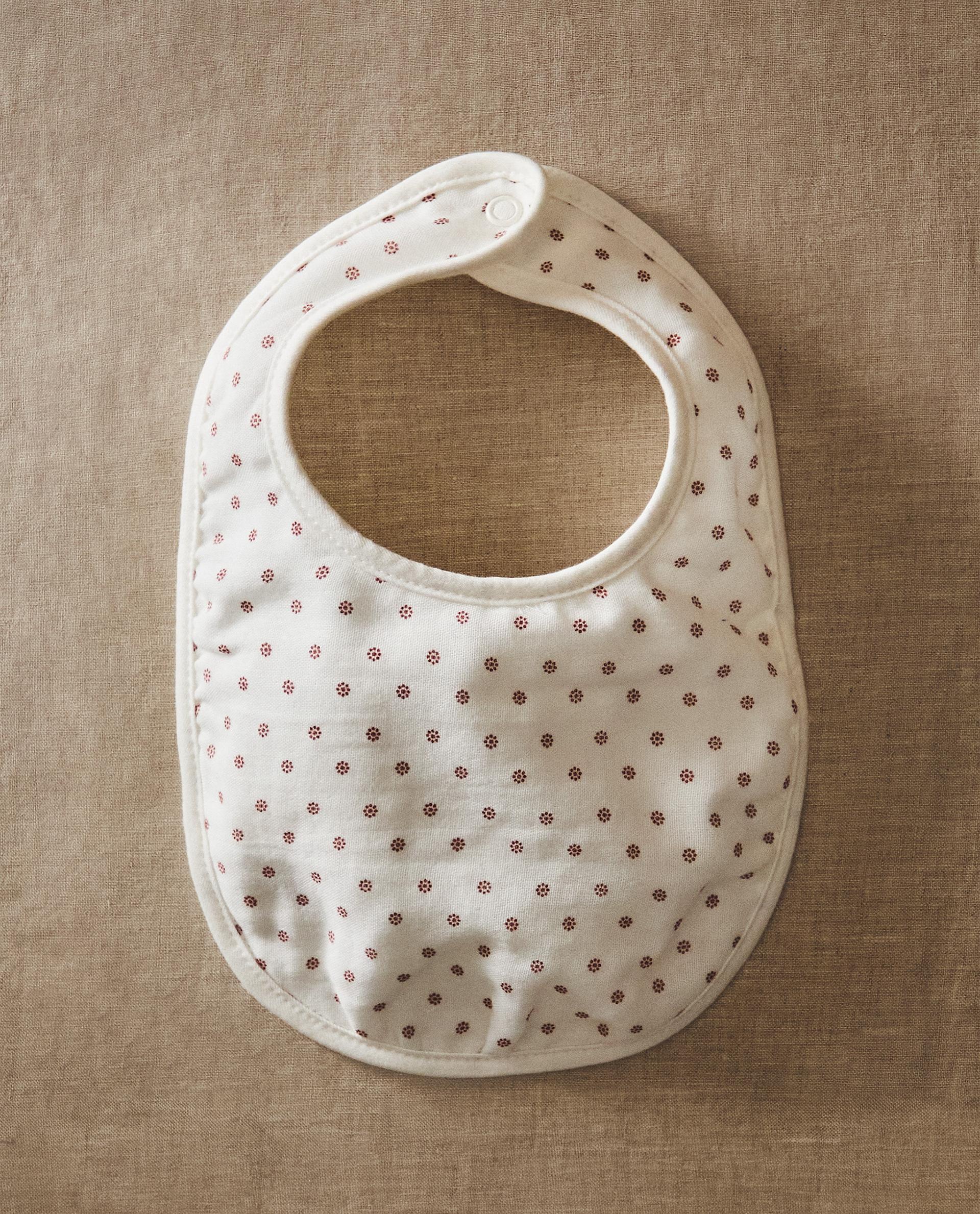 CHILDREN'S BIB WITH MINI FLORAL DESIGN