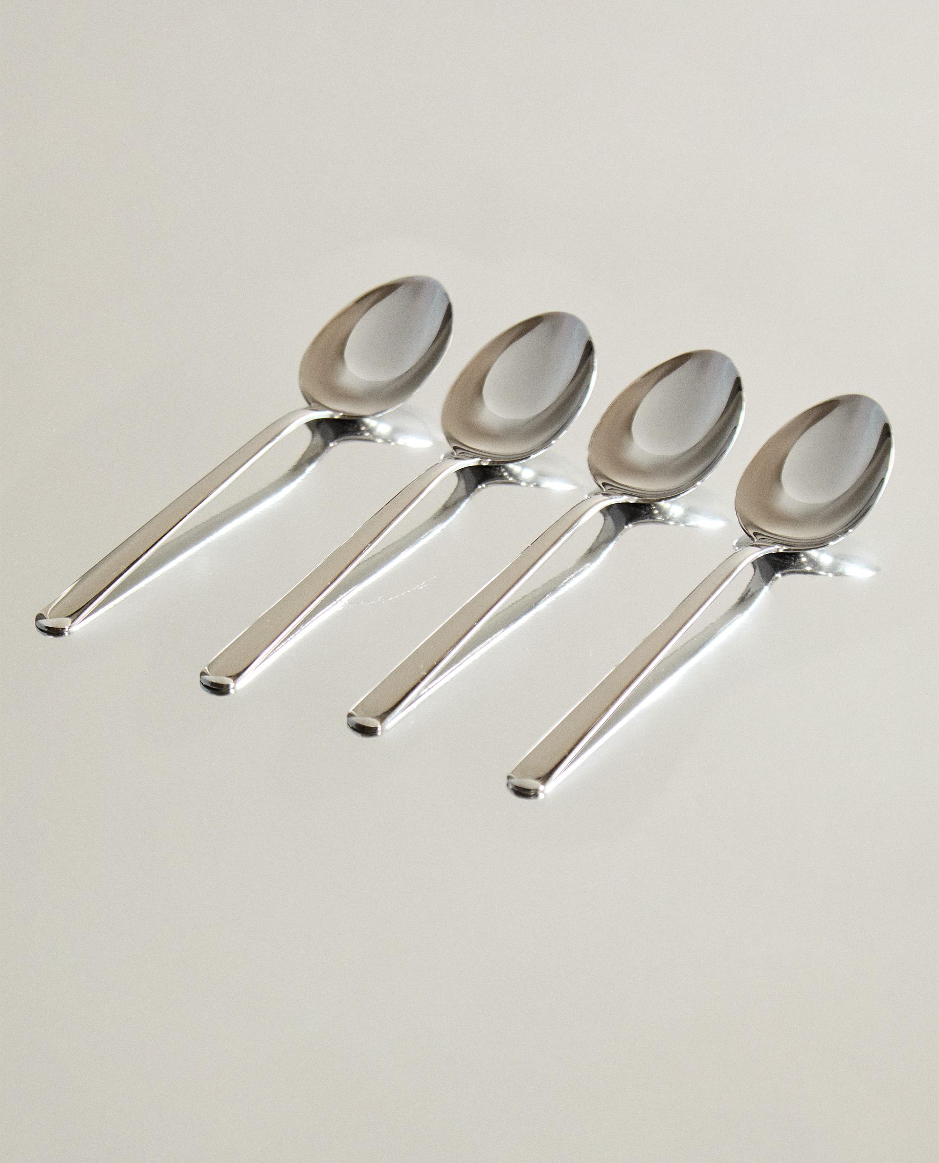 SET OF SHINY STEEL SPOONS