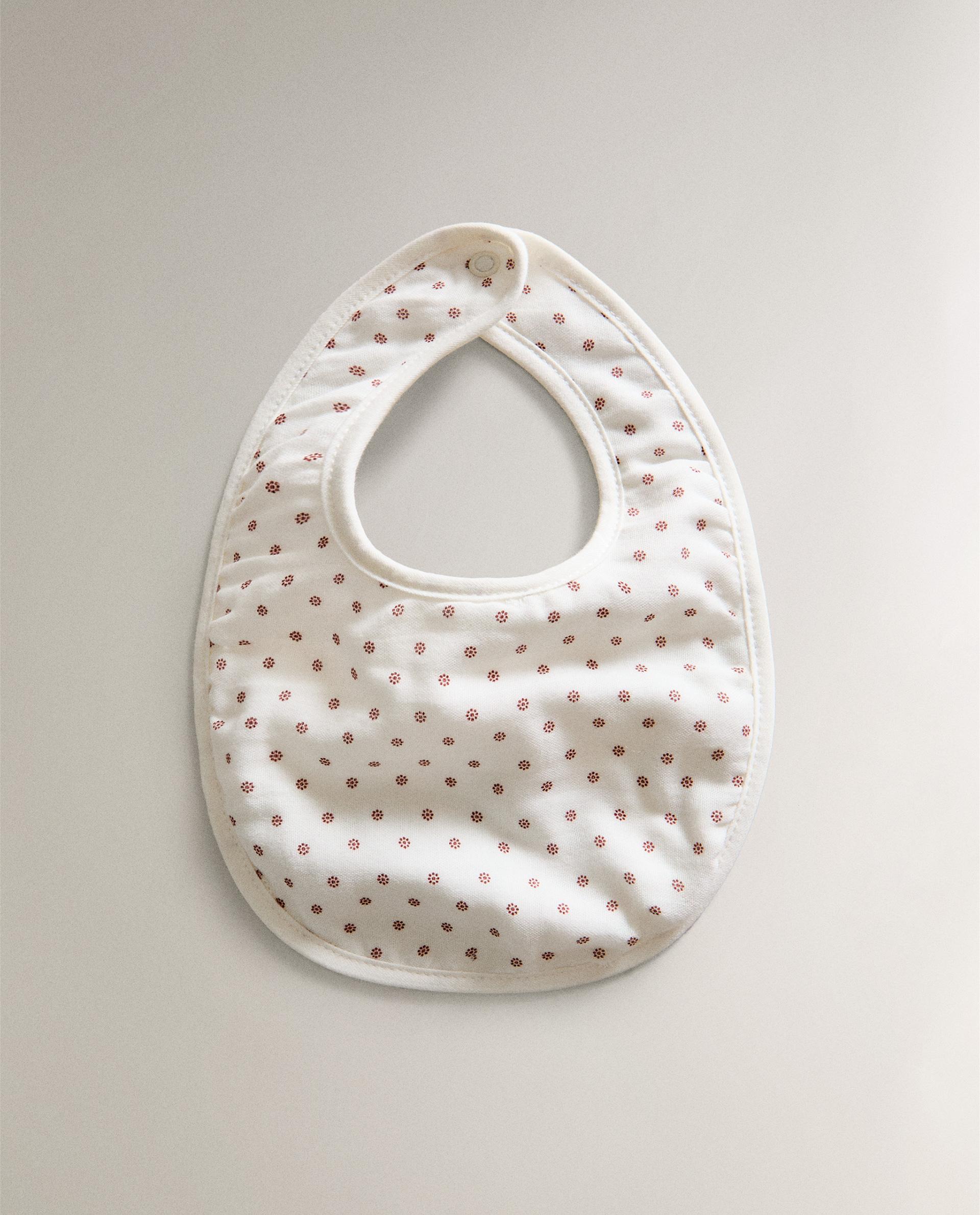 CHILDREN'S BIB WITH MINI FLORAL DESIGN